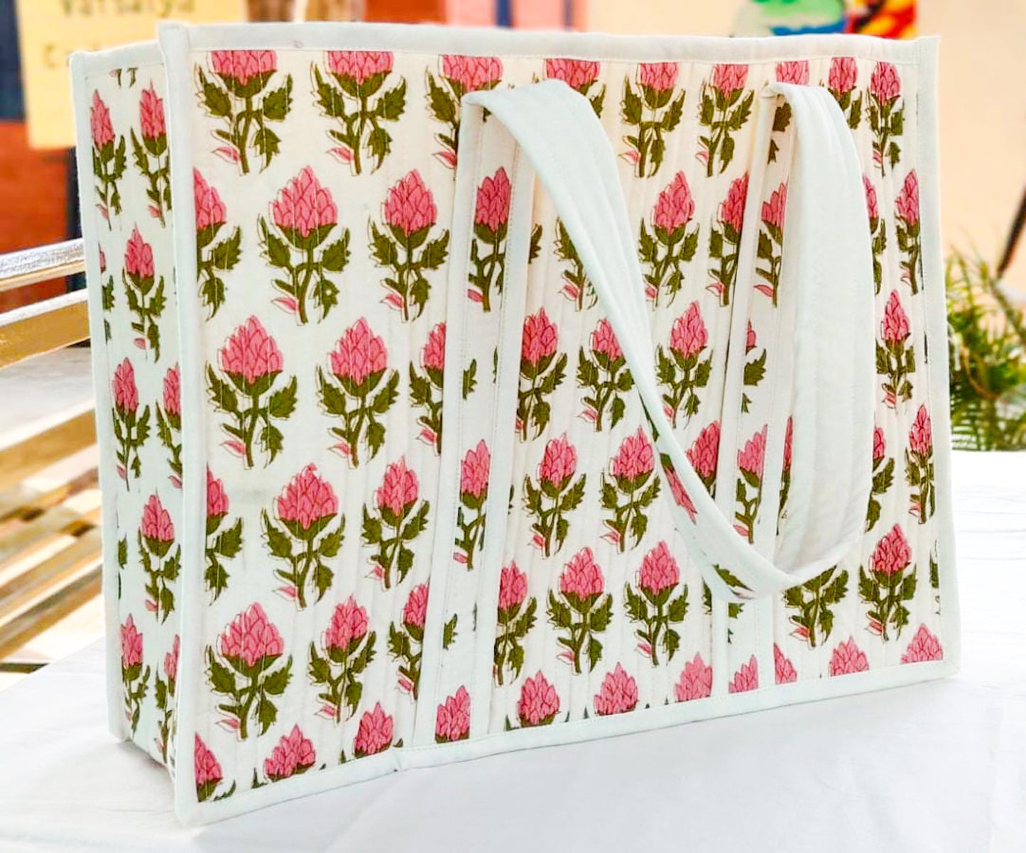 Large quilted weekend tote bag, vibrant pink block print, floral design