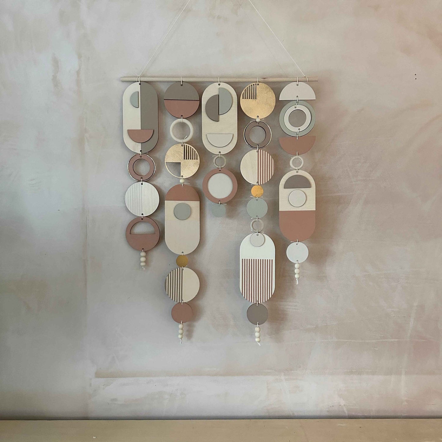 Modern Wall Art Gold Metal Hoop Detailing and Blush Pink Accents