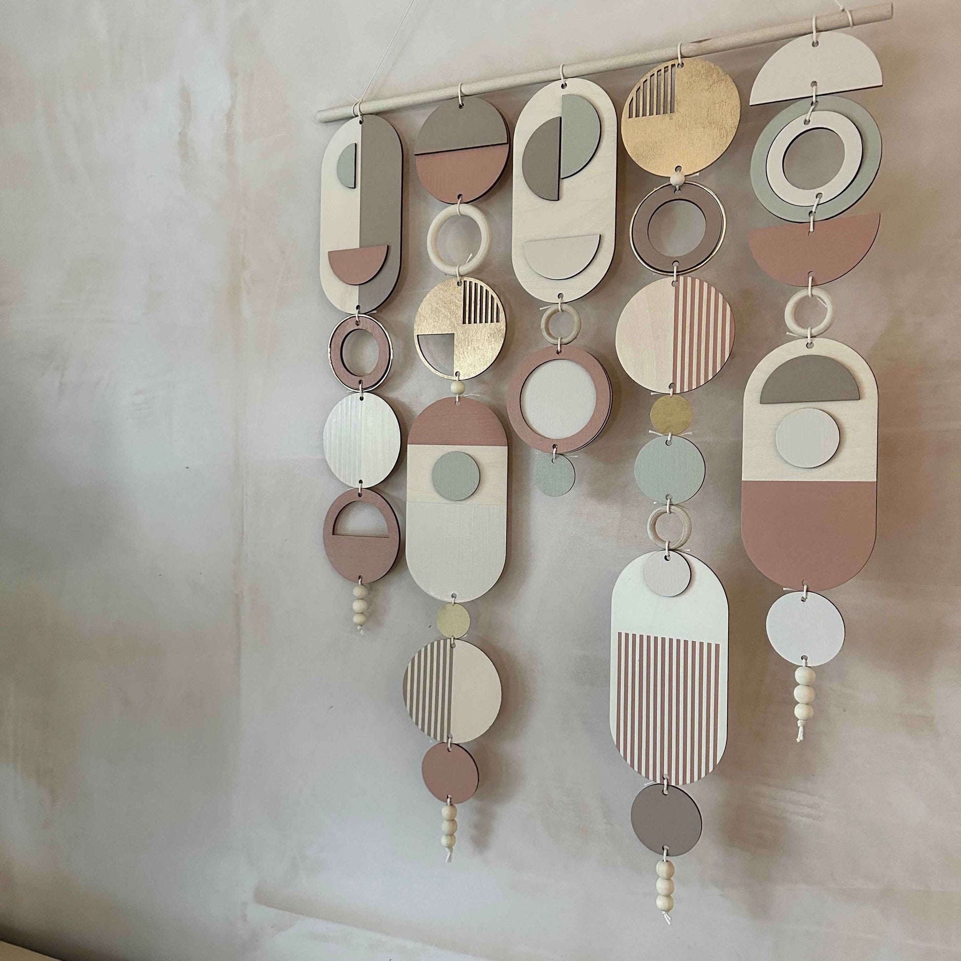 Modern Wall Art Gold Metal Hoop Detailing and Blush Pink Accents